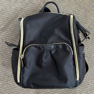 Satin back back with gold accents